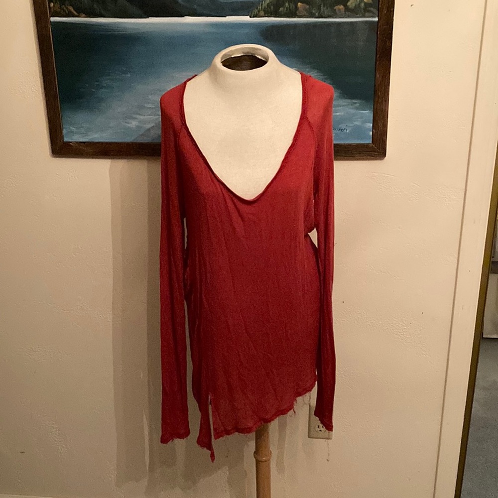 Red sheer-ish knit tunic with asym scraggly hem bohemian style deep scoop neck.